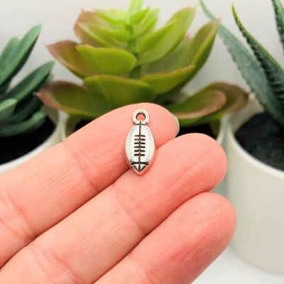 20 Pcs Small Silver Football Charms Image 1