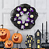 22" Emoteglow&#8482; Jack Skellington Musical Lighted Wreath Decoration Image 2