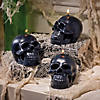 4" Black Skull-Shaped Wax Candles - 3 Pc. Image 1