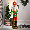 4 Ft. Light-Up Nutcracker with Drumsticks Christmas Decoration Image 1