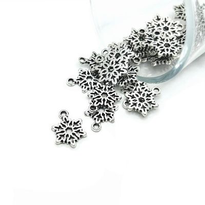 4 Pcs Silver Snowflake Christmas charms Image 1