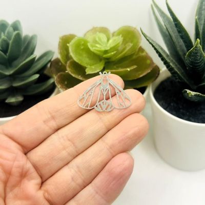 4 Pcs Steel Moth Pendants Image 1