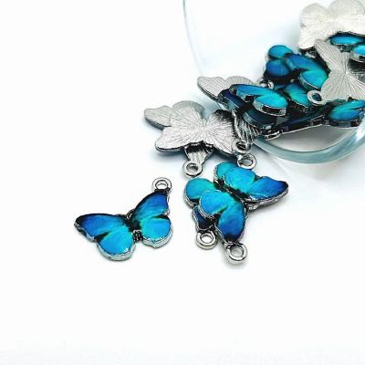 50 Pcs Aqua Blue Butterfly Charms Image 1