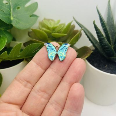 50 Pcs Aqua Blue Butterfly Charms Image 1