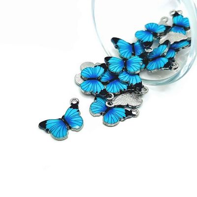 50 Pcs Aqua Blue Butterfly Charms Image 1