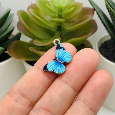 50 Pcs Aqua Blue Butterfly Charms Image 1