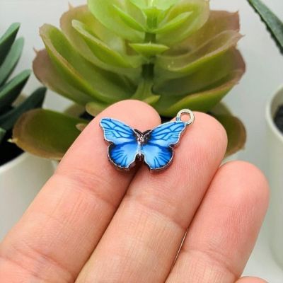 50 Pcs Blue Enamel Butterfly Charms Image 1