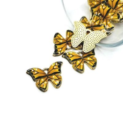 50 Pcs Orange Butterfly Charms Image 1