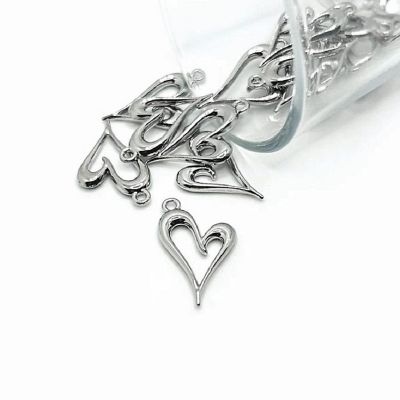 50 Pcs Silver Asymmetrical Heart Charms Image 1
