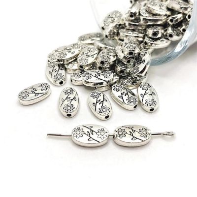 50 Pcs Silver Flower Print Spacer Beads Image 1
