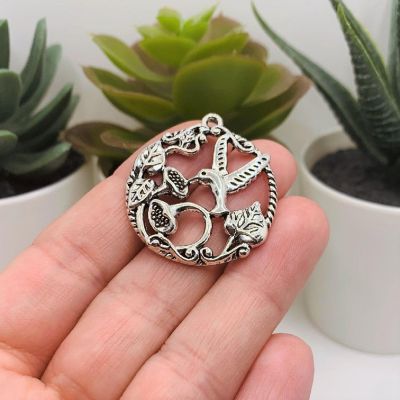 50 Pcs Silver Hummingbird Pendant Charms Image 1