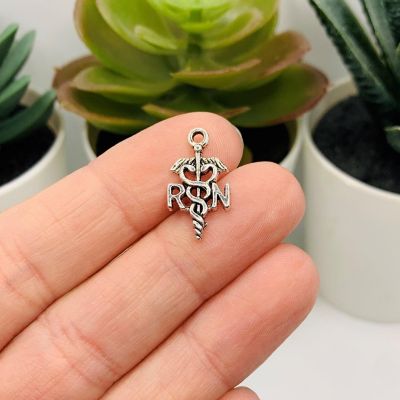 50 Pcs Silver RN with Caduceus Charms Image 1