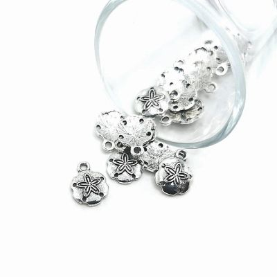 50 Pcs Silver Sand Dollar Charms Image 1