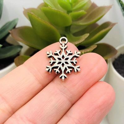 50 Pcs Silver Snowflake Christmas Charms Image 1
