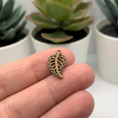 50 Pcs Small Scrolled Bronze Leaf Charms Image 2