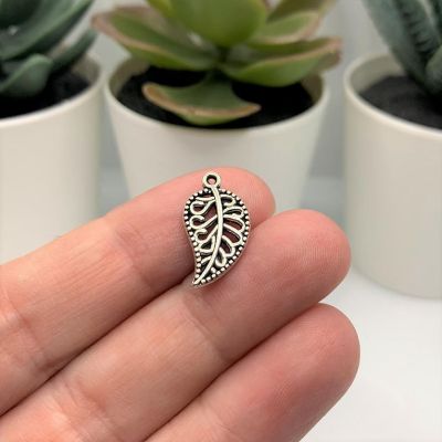 50 Pcs Small Scrolled Silver Leaf Charms Image 1
