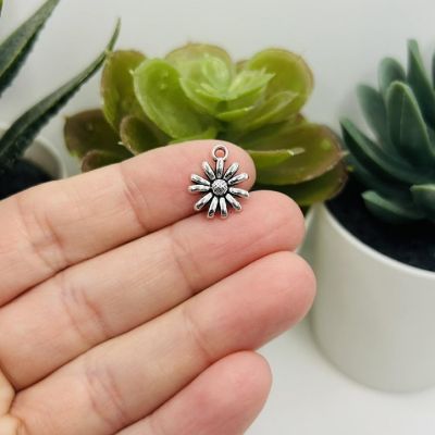 50 Pcs Small Silver Flower Charms Image 1
