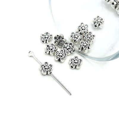 50 Pcs Small Silver Flower Spacer Beads Image 1