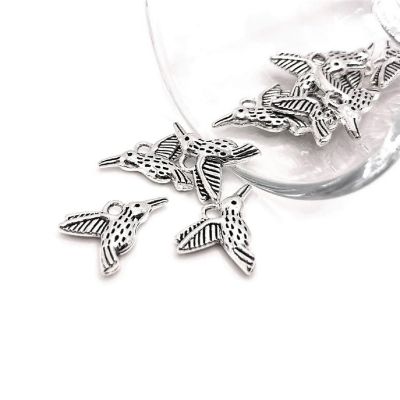 50 Pcs Small Silver Hummingbird Charms Image 1