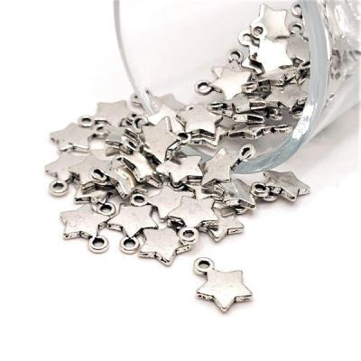 50 Pcs Small Silver Star Charms Image 1