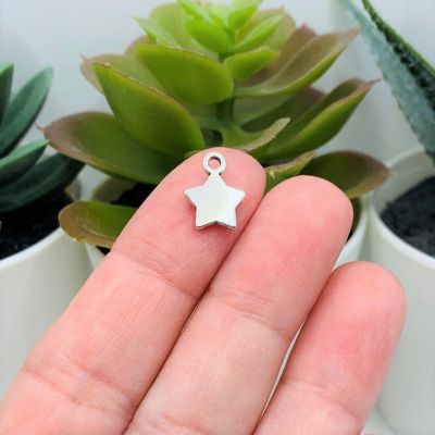 50 Pcs Small Silver Star Charms Image 1