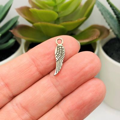 50 Pcs Tiny Silver Angel Wing Charms Image 1