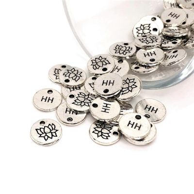 50 Pcs Tiny Silver Lotus Coin Charms Image 1