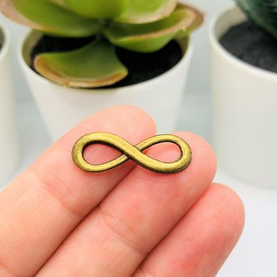 50 Pieces Bronze Infinity Charms Image 1