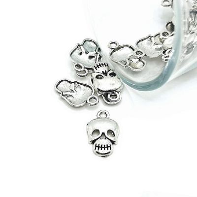 50 Pieces Halloween Silver Skull Charms Image 1