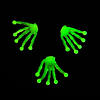 Bulk 48 Pc. Mini Glow-in-the-Dark Halloween Sticky Skeleton Hands Image 1
