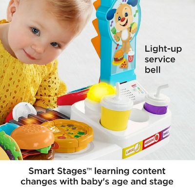 Fisher-Price Laugh & Learn Servin' Up Fun Food Truck with 20+ Piece Accessory Set Image 3