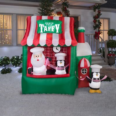 Gemmy Animated Christmas Airblown Inflatable North Pole Taffy Stand  7 ft Tall  Multicolored Image 1