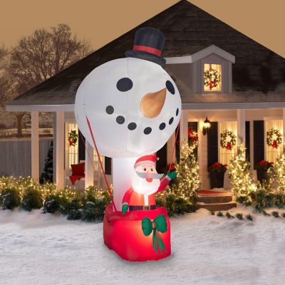 Gemmy Giant Christmas Airblown Inflatable Inflatable Snowman Hot Air Balloon with Santa  12 ft Tall Image 1