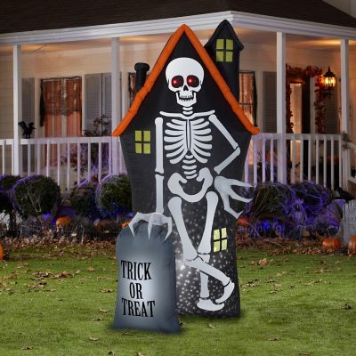 Gemmy Projection Airblown StarSpinner Skeleton and Haunted House Tombstone Scene (White)  8 ft Tall Image 1
