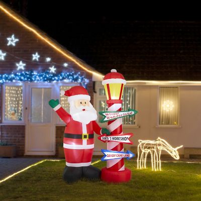 Glitzhome 7FT Lighted Inflatable Santa with Lamp Post Sign Decor Image 1
