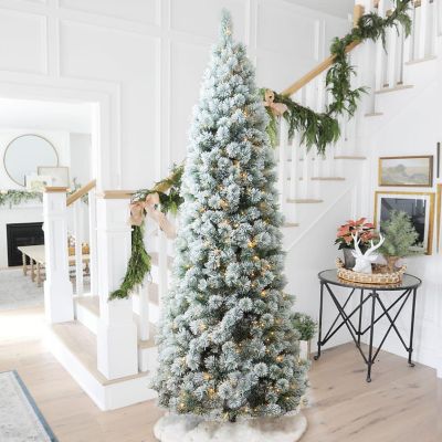 Glitzhome 9ft Pre-Lit Flocked Pencil Pine Artificial Christmas Tree with 500 Warm White Lights, 3 function Image 1