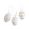 Gold & White Patterned Plastic Easter Ornaments - 12 Pc. Image 1