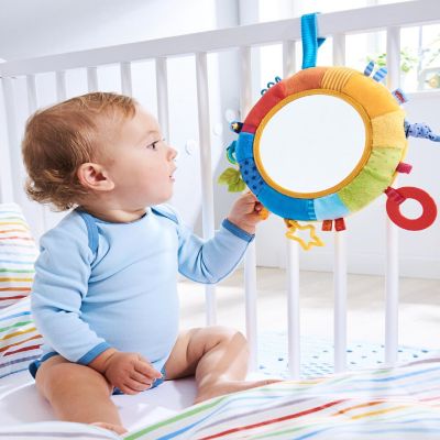 HABA Rainbow Discovery Mirror - Hang from Crib or Use as a Pillow with Entertaining Elements for Baby to Explore Image 2