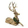 Laying Deer Figurine With Holly Wreath Deer (Set Of 2) 8.5"L X 10.5"H, 10.25"L X 10.5"H Resin Image 1