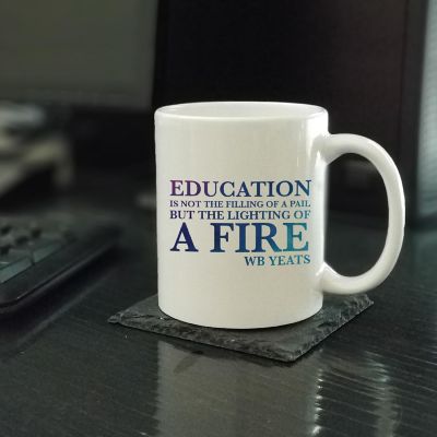 Lighting the Fire Education Ceramic Mug Image 1
