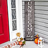 National Tree Company 39 in. Halloween "Unwelcome Porch Sign with Spider Webs Image 1