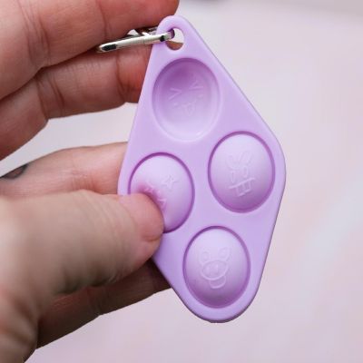 Pop Fidget Toy Purple 4-Button Silicone Keychain Accessory Image 2