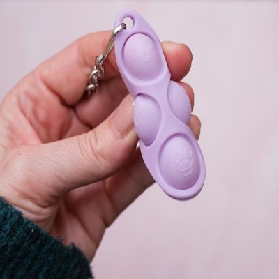 Pop Fidget Toy Purple 4-Button Silicone Keychain Accessory Image 3
