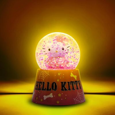 Sanrio Hello Kitty Pink Skeleton 3-Inch Mini Light-Up Snow Globe Image 1