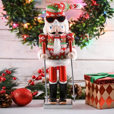 Skier Man Nutcracker  Red and Green Wooden Nutcracker Guy with Ugly Sweater and Ski Sticks Image 2