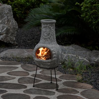 Vintiquewise Outdoor Clay Chiminea Fireplace Sun Design Wood Burning Fire Pit with Sturdy Metal Stand Image 1