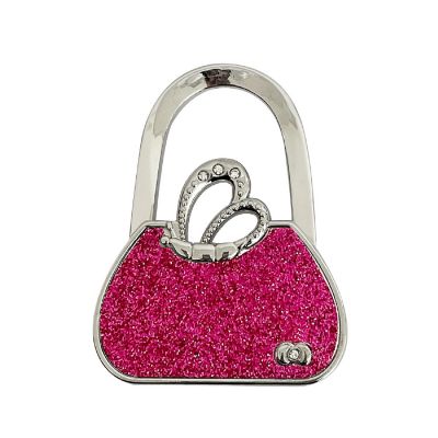 Wrapables Stylish Purse Hook Hanger, Foldable Handbag Table Hanger, Pink Handbag Image 1