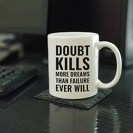 Doubt Kills Dreams ceramic mug