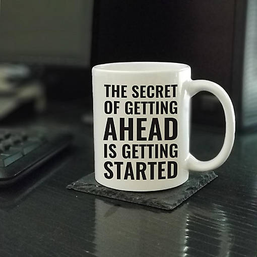 Getting Ahead Starts ceramic mug