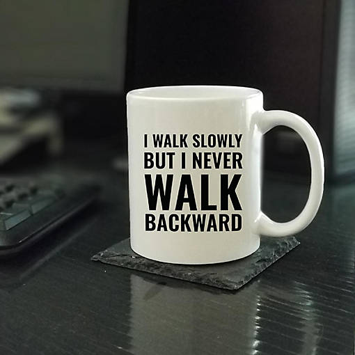 I Walk Slowly Never Backward Ceramic Mug